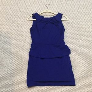 Navy blue dress with open back.